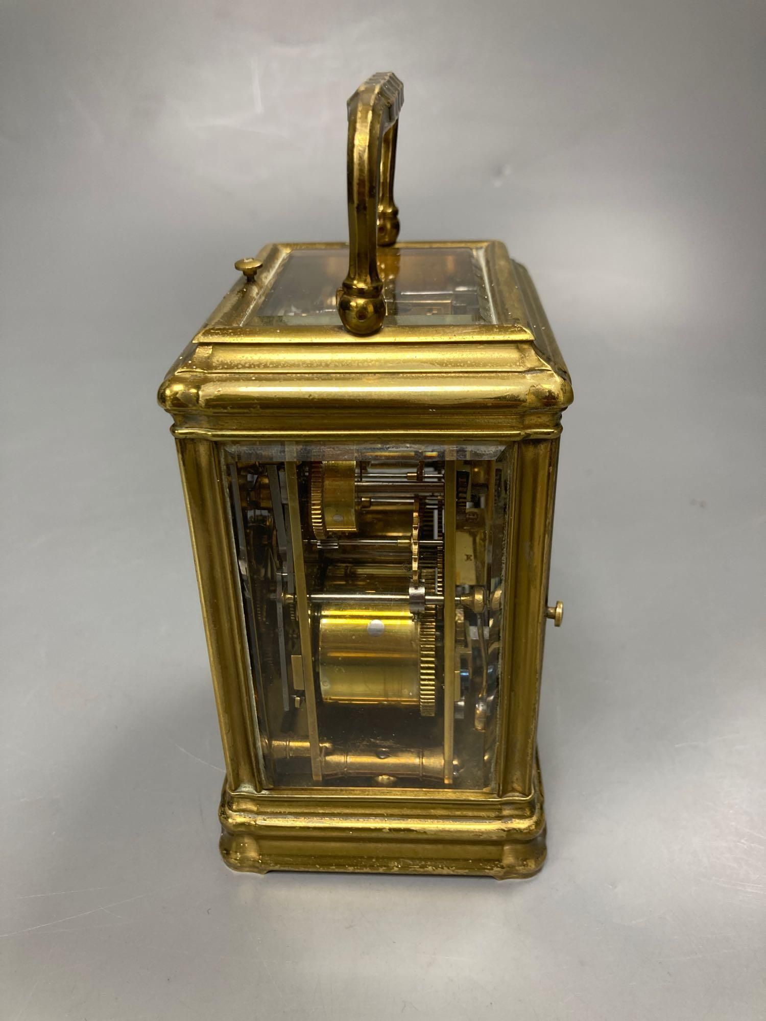 A brass repeating carriage clock- Drocourt, in gorge case, 16cm high including handle